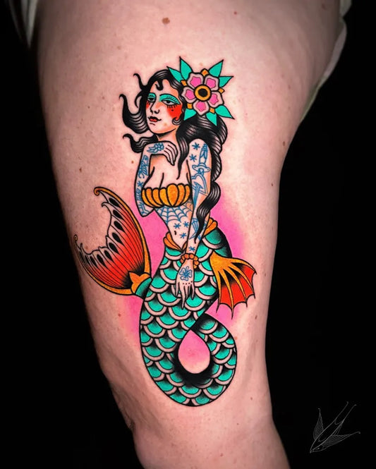 Medium Traditional Mermaid Tattoo on Women Arm by @keeganblairtattoo