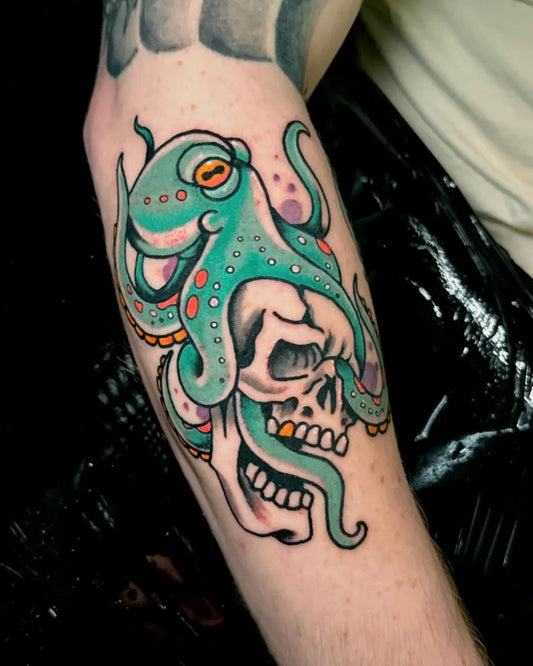 Medium Traditional Octopus Skull Nautical Tattoo on Men Arm by @renot_aragontattoo