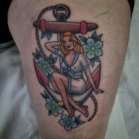 Medium Traditional Pin Up Girl Anchor Flowers Tattoo on Women Thigh by @circleofswords