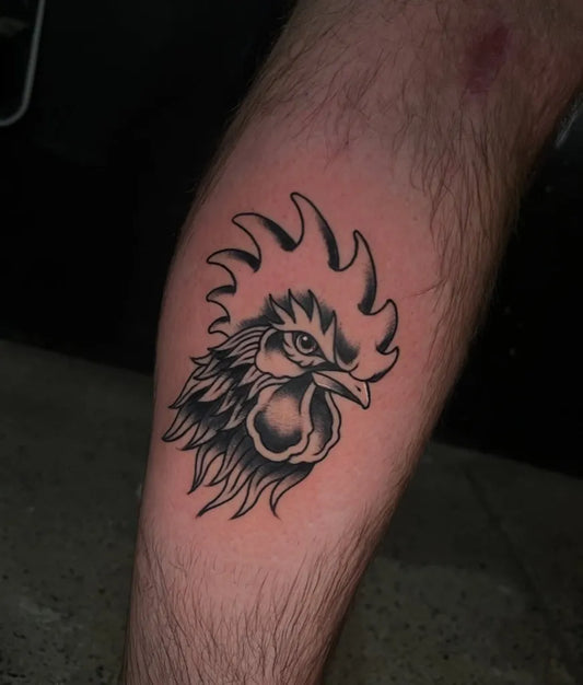 Medium Traditional Rooster Tattoo on Men Leg by @facundomoreno.tattoo