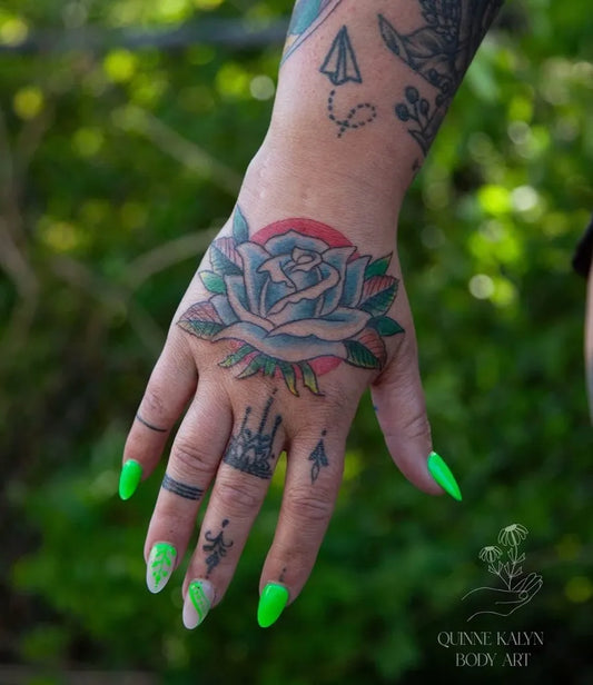 Medium Traditional Rose Tattoo on Women Hand by @artwerkstattoos