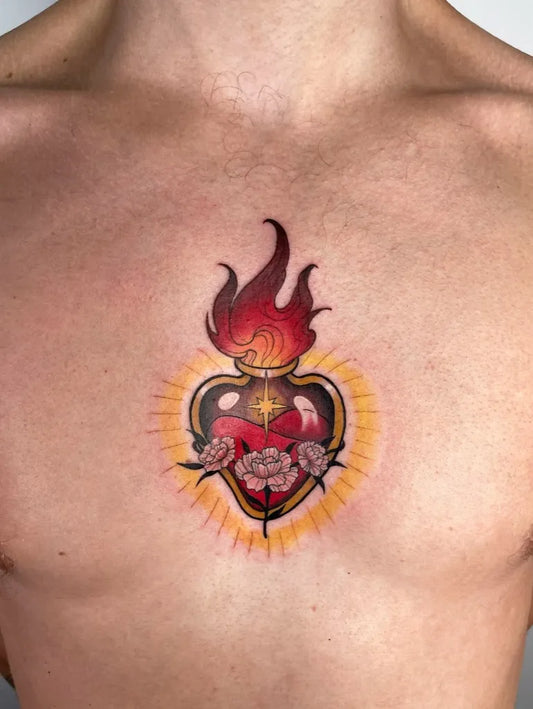 Medium Traditional Sacred Heart with Flames and Roses Tattoo on Men Chest by @chihirotattoos