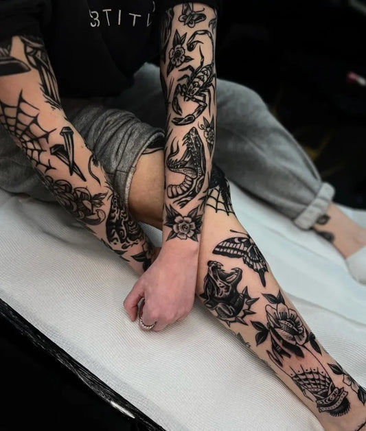 Medium Traditional Scorpion Rose Web Tattoo on Men Arm by @traditionaltattooink