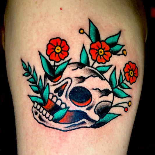 Medium Traditional Skull Flowers on Men Arm Tattoo by @pappylongtats