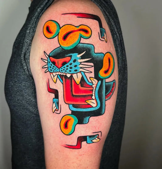 Medium Traditional Stylized Jaguar Tattoo on Men Arm by @burtontattoos