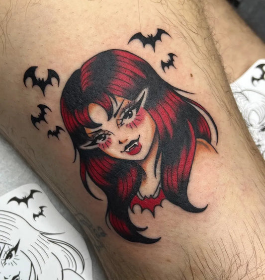 Medium Traditional Vampire Girl with Bats Tattoo on Women Thigh by @ellenmellon.tattoos