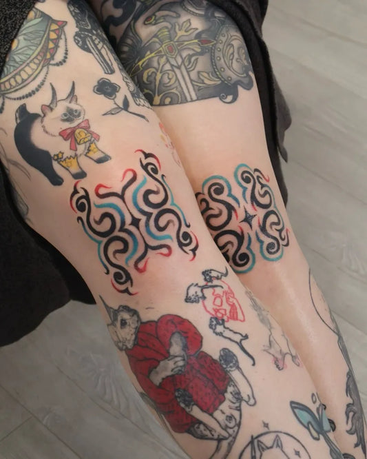 Medium Tribal Abstract Swirls and Skull Tattoo on Women Knee by @ladybao.tattoo
