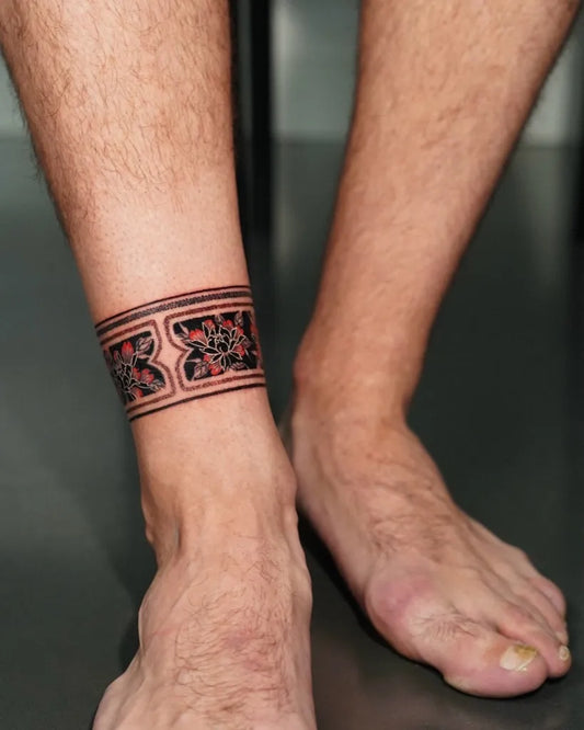 Medium Tribal Band Tattoo on Men Ankle by @taena.tattoo