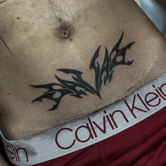 Medium Tribal Wings Tattoo on Men Stomach by @_gvthicink