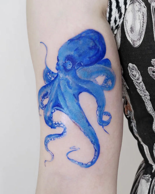 Medium Watercolor Blue Octopus Tattoo on Women Arm by @aroha_tattoo