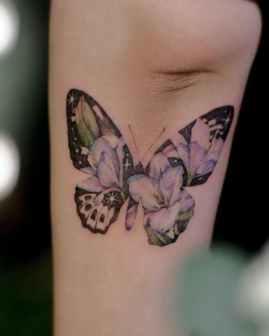 Watercolor Butterfly on Women Forearm Tattoo by @gracie.tattooer