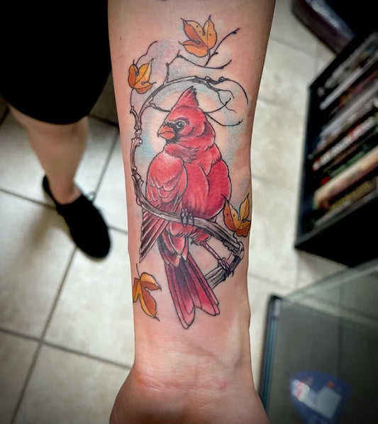 Medium Watercolor Cardinal with Autumn Leaves Tattoo on Women Arm by @red5tattoo