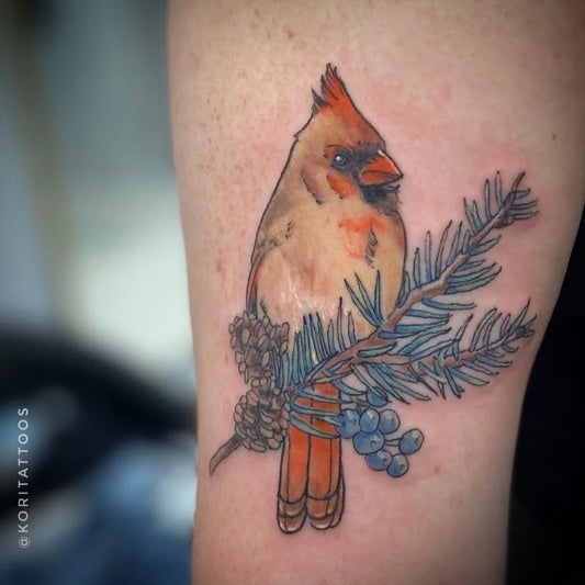 Medium Watercolor Cardinal with Pine Cone and Berries Tattoo on Women Arm by @diamondheart_tattoo