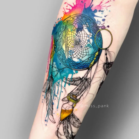 Medium Watercolor Dream Catcher Feathers Tattoo on Women Arm by @watercolortattoos