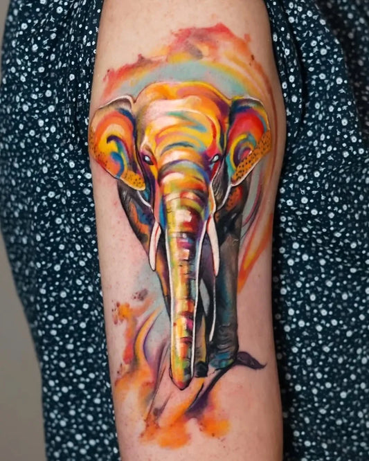 Medium Watercolor Elephant Tattoo on Women Arm by @inkgarden