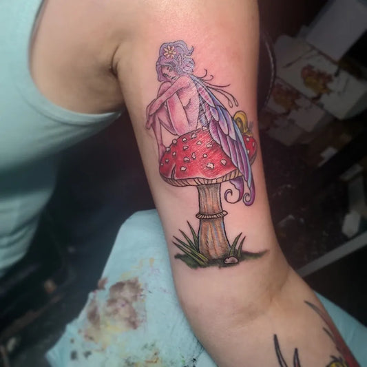 Medium Watercolor Fairy Mushroom Tattoo on Women Bicep by @_lydiathetattoolady