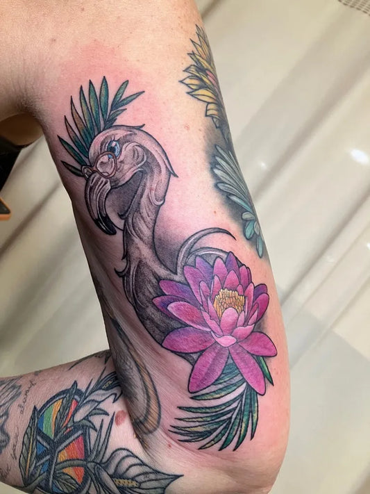 Medium Watercolor Flamingo Lotus Flower Tattoo on Women Arm by @200_tattoo