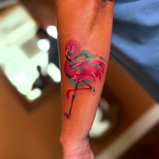 Medium Watercolor Flamingo Tattoo on Women Arm by @randyswift