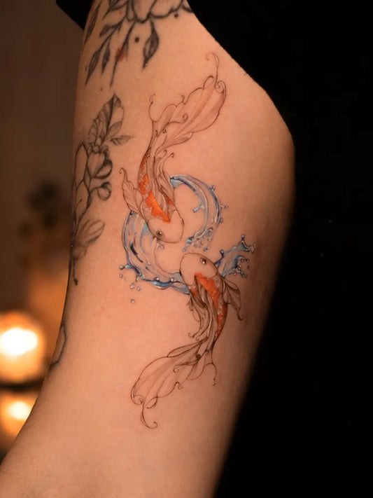 Medium Watercolor Koi Fish Tattoo on Women Arm by @qpauu.tattoo