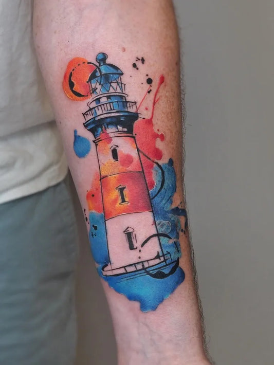 Medium Watercolor Lighthouse and Sun Tattoo on Men Arm by @moni_lien_pham