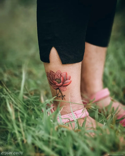 Medium Watercolor Lotus Flower on Women Leg Tattoo by @alivetattoos