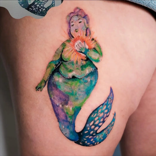 Medium Watercolor Mermaid with Sun Tattoo on Women Thigh by @inkynas