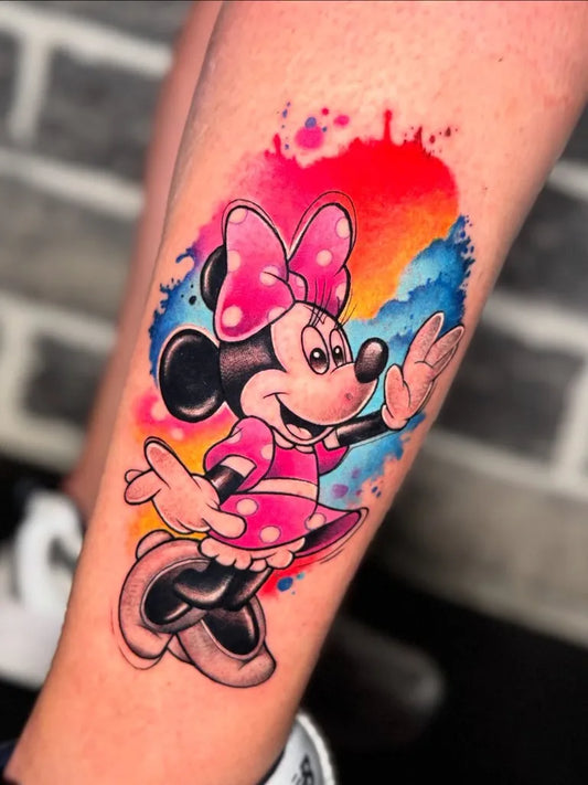 Medium Watercolor Minnie Mouse Cartoon Tattoo on Women Arm by @anax_ink