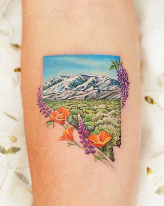 Medium Watercolor Nevada Landscape with Mountains and Flowers Nature Tattoo on Women Arm by @enni.tattoo