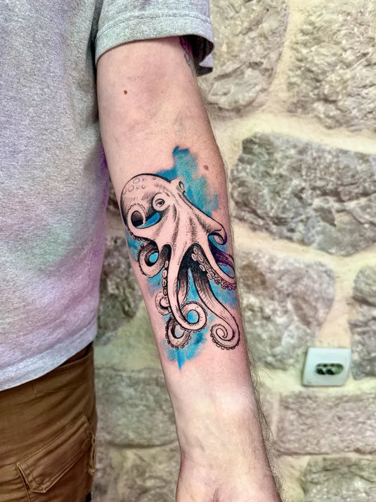 Medium Watercolor Octopus Tattoo on Men Arm by @kotorink