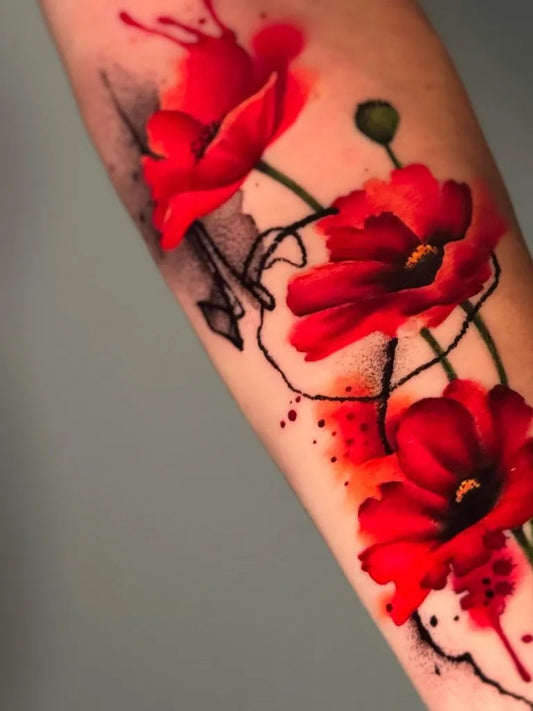 Medium Watercolor Poppy Flowers Tattoo on Women Arm by @simona_tavcitattoo