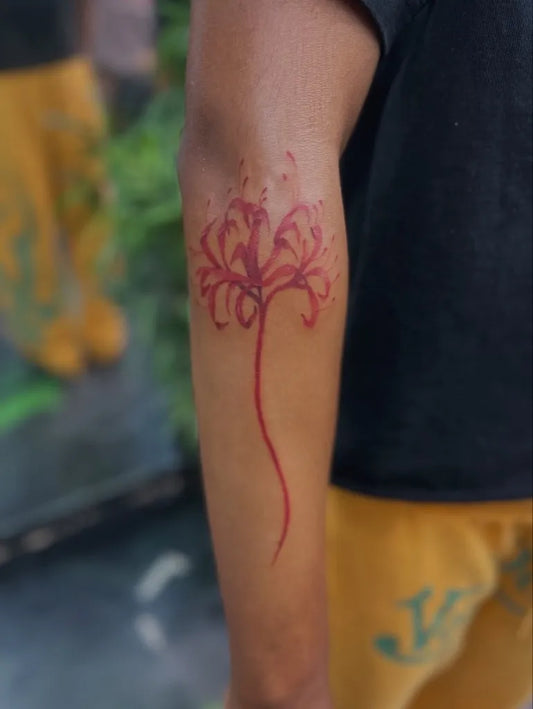 Medium Watercolor Red Spider Lily Tattoo on Men Arm by @inked_moses