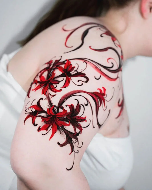 Medium Watercolor Red Spider Lily and Swirls Tattoo on Women Shoulder by @onyo_flowertattoo