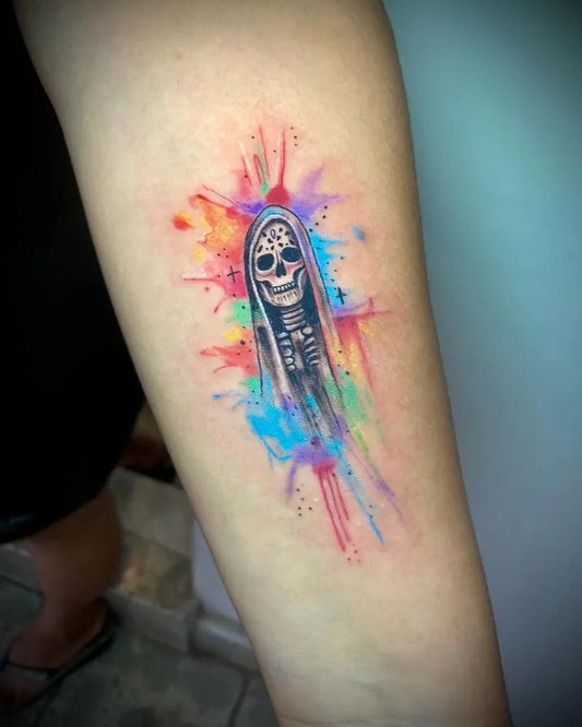 Medium Watercolor Santa Muerte Tattoo on Women Arm by @tattoo_rosaburgos