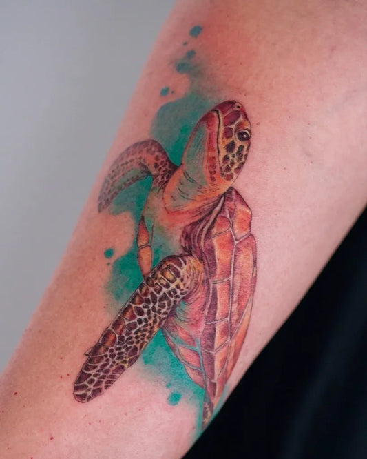 Medium Watercolor Sea Turtle Tattoo on Women Arm by @tattoojune
