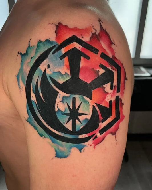 Medium Watercolor Sith Logo Star Wars Tattoo on Men Shoulder by @mugshot.tattoo