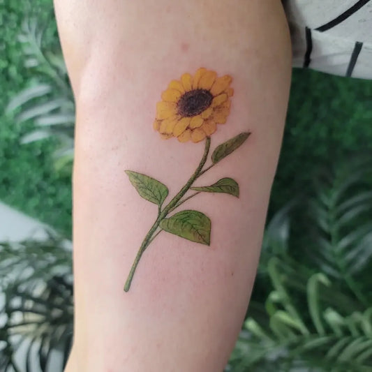 Medium Watercolor Sunflower on Women Arm Tattoo by @neon.alchemist