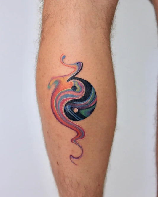 Medium Watercolor Yin Yang Swirls Tattoo on Men Leg by @alua.ninja