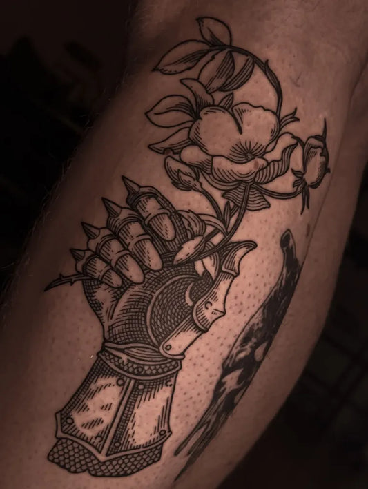 Medium Woodcut Armored Gauntlet Holding Rose Tattoo on Men Arm by @deadrealsoon