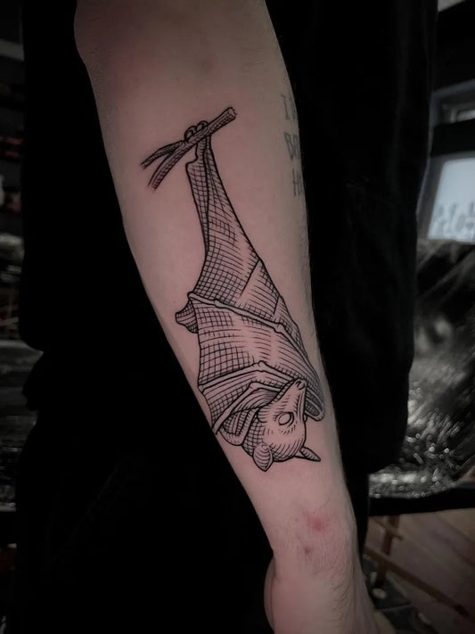 Medium Woodcut Bat Tattoo on Men Arm by @maxamos