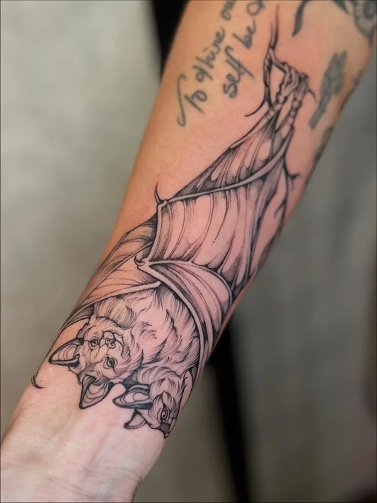 Medium Woodcut Bat Tattoo on Men Arm by @zoeloutattoo