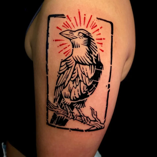 Medium Woodcut Crow with Halo and Frame Tattoo on Women Arm by @sweetbaphomet
