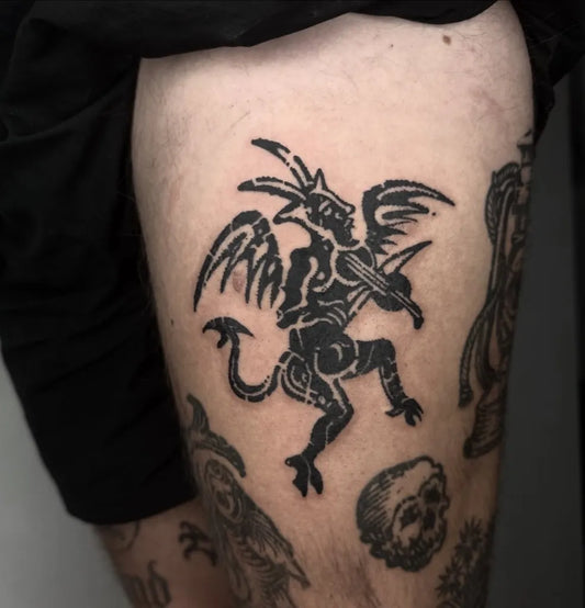 Medium Woodcut Demon Tattoo on Men Thigh by @kajetankarczewski