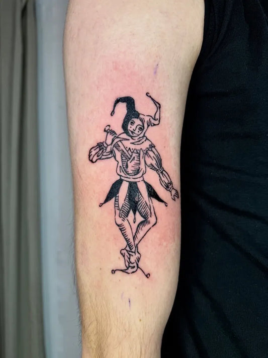 Medium Woodcut Jester Tattoo on Men Arm by @oni.chams