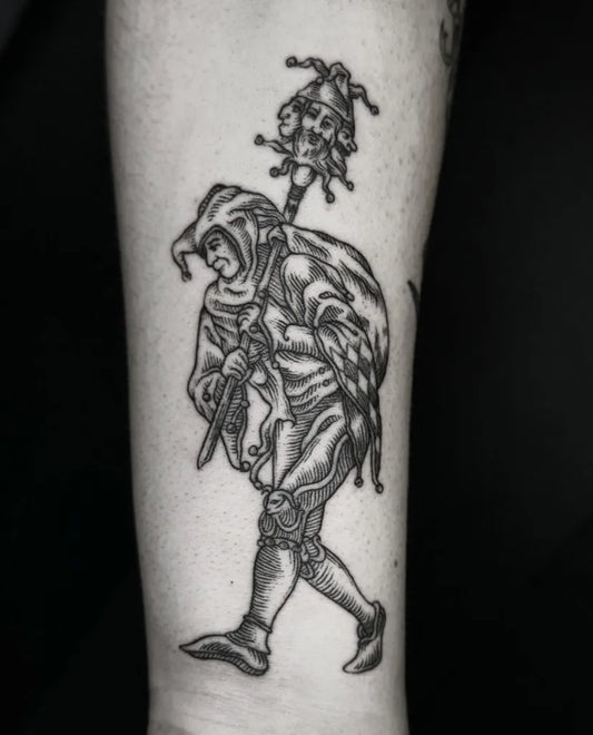 Medium Woodcut Jester with Skull Scepter Tattoo on Men Arm by @dr.lucidius