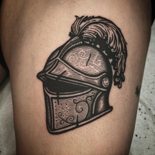 Medium Woodcut Knight Helmet Tattoo on Men Arm by @alexanders.tats