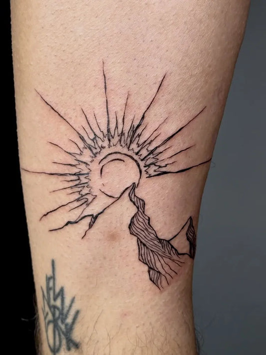 Medium Woodcut Mountain and Sun Tattoo on Men Leg by @yessi_ink