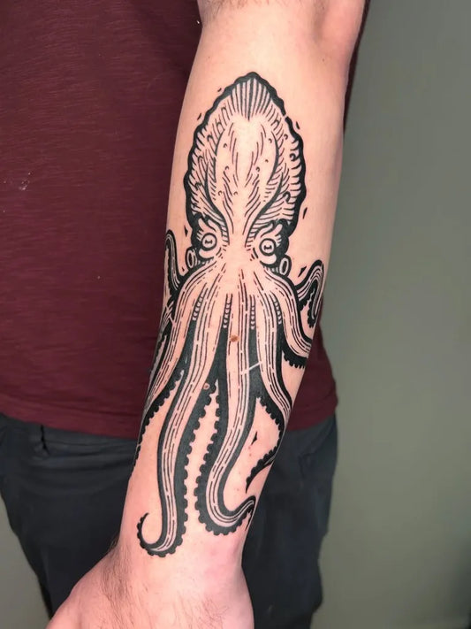 Medium Woodcut Octopus Tattoo on Men Arm by @5tinyknives