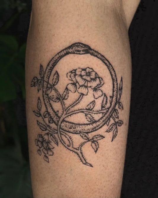 Medium Woodcut Ouroboros Flower Tattoo on Women Arm by @samclaw