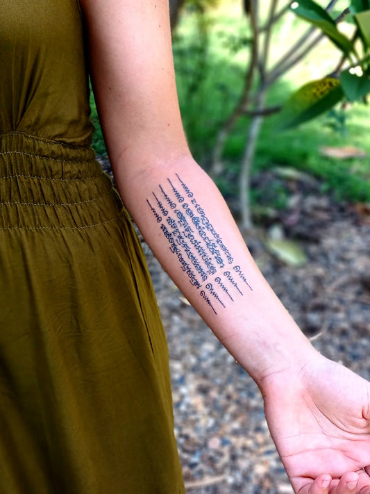 Sak Yant Inner Arm Tattoo by @sak_yant_pai.webp