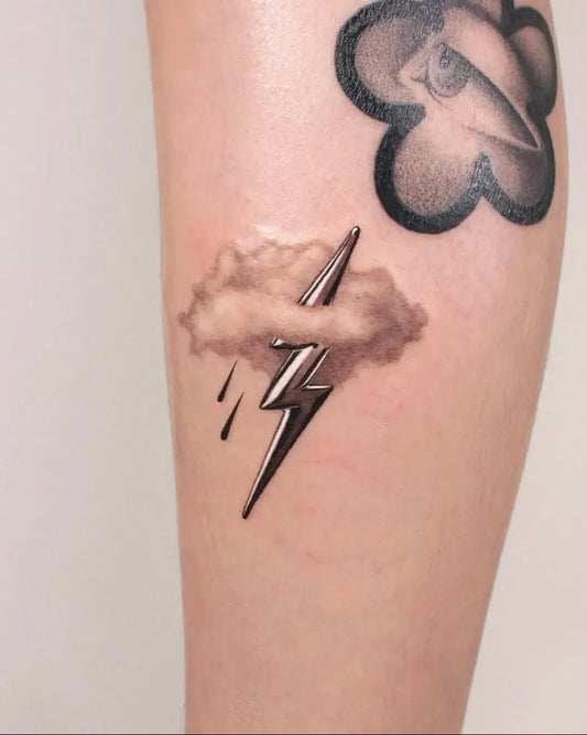 Small 3D Lightning Cloud Tattoo on Women Thigh by @txttooing